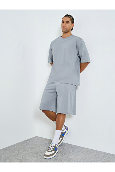 Styli Men Oversized Cut and Sew Panel T-Shirt and Shorts Co-Ords