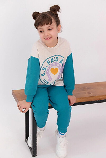 U.S. Polo Assn. طقم بدلة رياضية للفتيات من Live Love Neigh Cream Melange