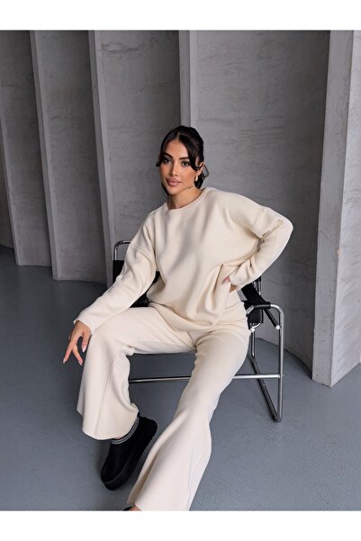 erki triko طقم سترة برقبة دائرية وبنطلون سفلي علوي