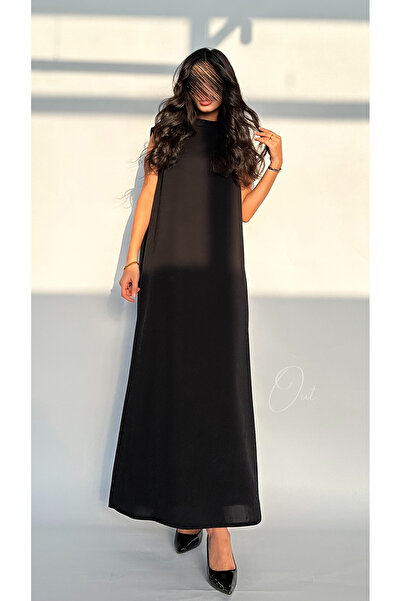 outline فستان عباية اسود من قماش البلاك بيري