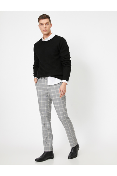 Koton Kostkované kalhoty uvolněného střihu s detailem kapsy