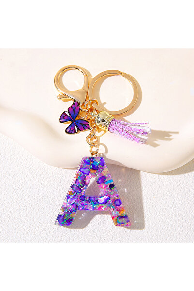 Choice سلسلة مفاتيح على شكل حرف أبجدي مع تعليقة أرجوانية وشرابة، مصنوعة من ال...