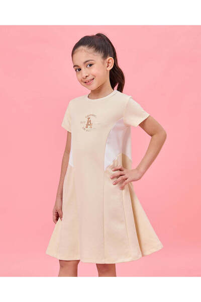 REDTAG فستان بناتي بيج اللون، مصنوع بتقنية القص والخياطة المتداخلة