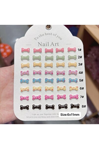 Choice مجموعة متنوعة - 100 قطعة من زينة أظافر على شكل عظمة كلب - زينة راتنجية...