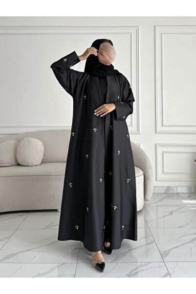 OLGA-ABAYA Elegant and modern abaya from Olga, made of linen fabric with embe...