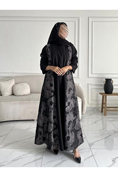 OLGA-ABAYA A stylish and modern abaya from Olga, made of embroidered linen fa...