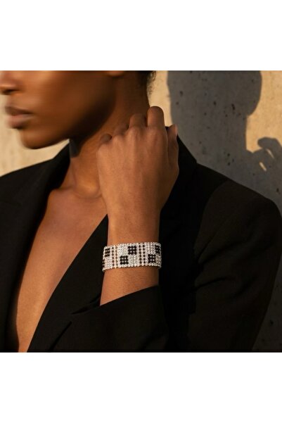 COCOSH TAKI Elegant evening bracelet with silver and black zircon stones.