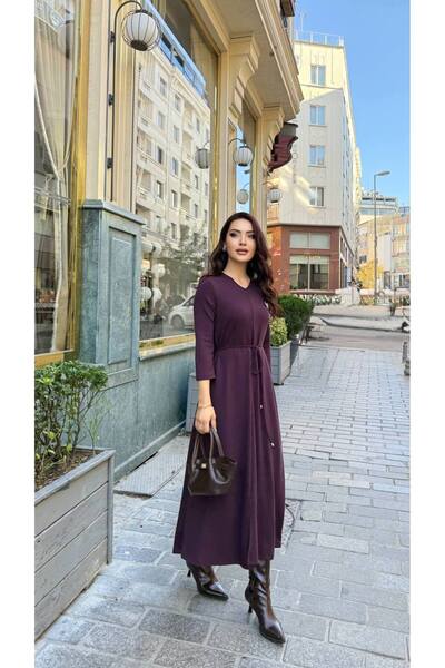 Genesis cannes فستان كان لالا بياقة على شكل حرف V وحزام عند الخصر بطول ماكسي ...