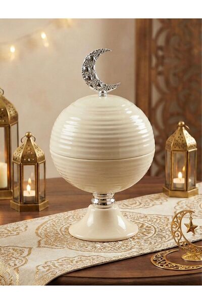 Noor A luxurious date-shaped serving tray made of iron, with an elegant Ramad...