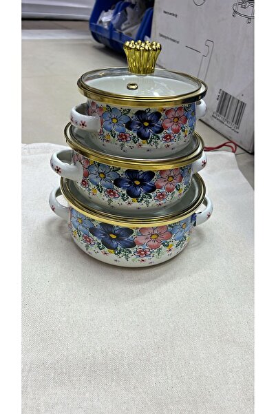 South house A set of patterned soup pots with glass lids, available in three ...