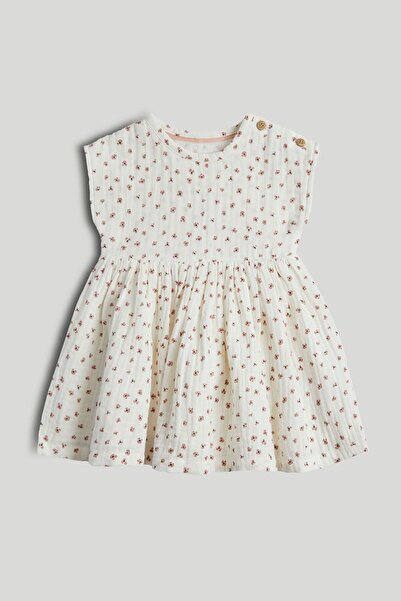 MOTHERCARE فستاني الوردي الأول