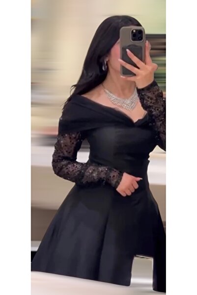 MAIN DRESS Mikado dress in a royal black color with eye-catching sleeves