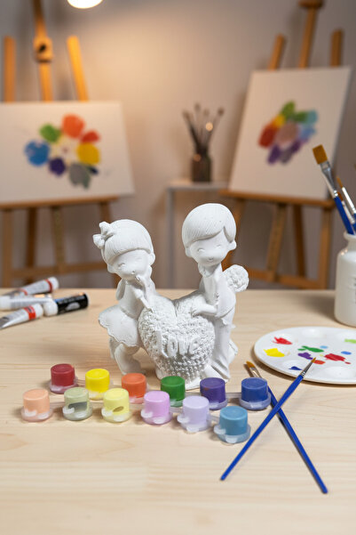 adanaçiçekliatölye SEVGİLİ HEYKEL MODELLERİ KALP ÜSTÜNDE DURAN ÇİFT