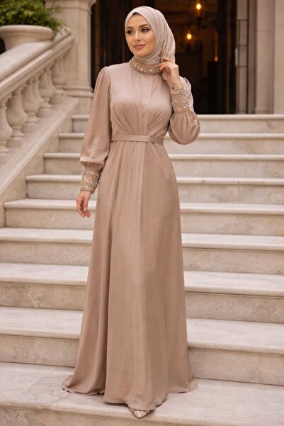 KLID A modest evening dress with luxurious embroidery and a high neckline.