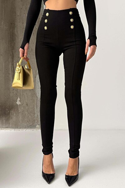 Mine Tan Butik بنطال ضيق نسائي ذو خصر عالٍ وتفاصيل مضلعة بأزرار ذهبية يبرز ان...