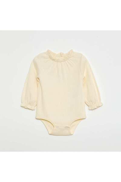 KIABI بدلة جسم بيضاء بأكمام طويلة محبوكة بنمط بوانتيل