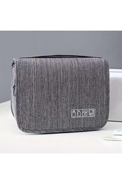 Choice حقيبة سفر رمادية اللون تُعلق على الحائط، تحتوي على أدوات النظافة الشخص...