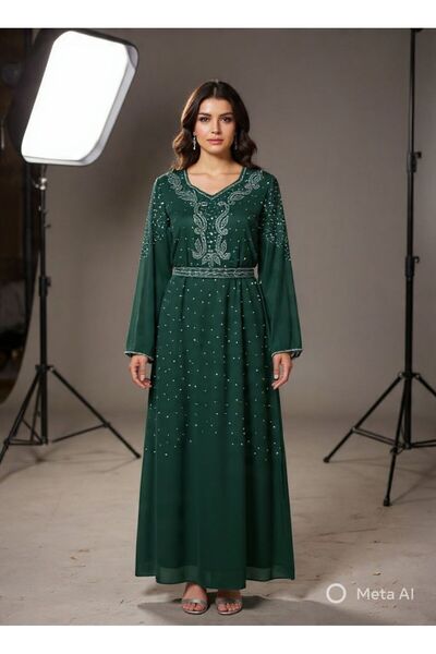 NALA FASHION Jalabiya in a deep dark green color, suggesting tranquility and ...