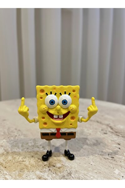 Pembe Karavan Orta Parmak Yapan Mini Sünger Bob (yükseklik 7.5 cm)