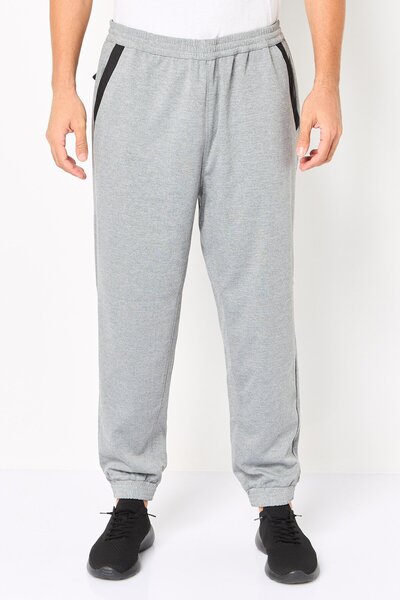 Dkny بنطال رياضي رجالي رمادي اللون، بقصة عادية، بلون موحد وقابل للتمدد.