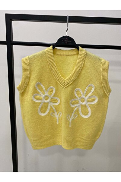 Hatun Atila سترة تريكو بياقة على شكل حرف V مع تفاصيل مطرزة باللون الأصفر