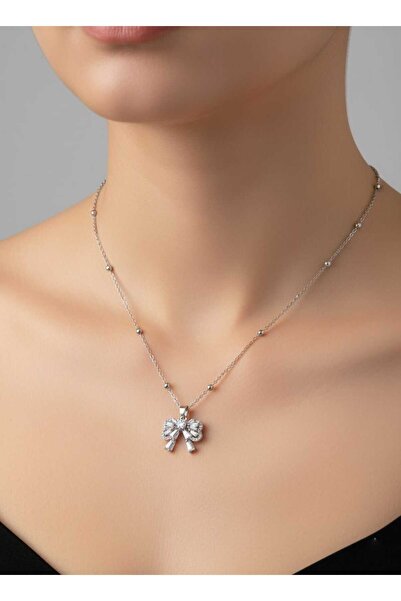 NKIE JEWELS قلادة فضية اللون بتصميم فيونكة وسلسلة كروية من الفولاذ - 3764