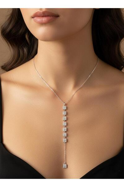 Stilbenim قلادة فضية اللون من الفولاذ