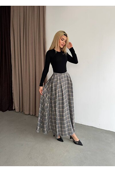 manana fashion تنورة ميدي بتفاصيل جيب طويلة ونمط منقوش