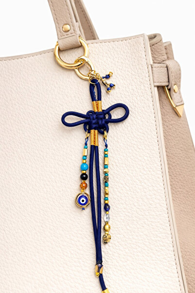 She Sells إكسسوار حقيبة على شكل عقدة الحظ من الباراكورد (إكسسوار الحظ والبركة)