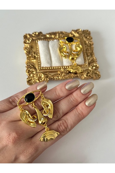 Charmist أقراط ليندا الذهبية بتصميم فولاذي