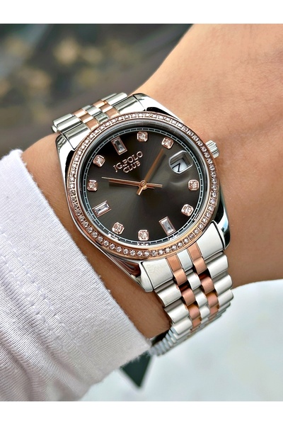 JG. Polo Club ساعة يد نسائية بسوار فولاذي وعلبة فولاذية باللون الذهبي مع تقوي...