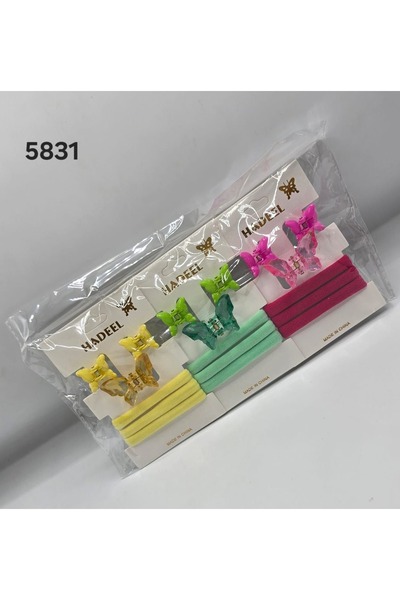 HADEEL GIJAMAI A set of medium-sized butterfly-shaped hair clips, ties, and b...