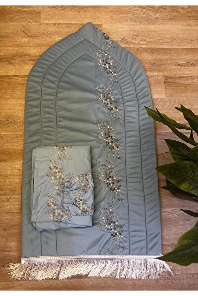 alzawia A set of embroidered, padded foam prayer mats with a matching embroid...