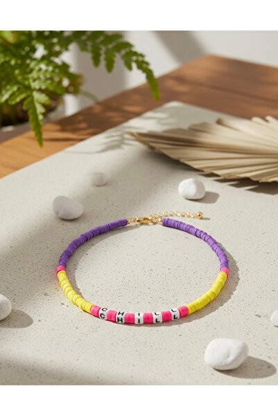 Handmade Yellow and Purple Fimo Necklace with the Word'Chill' Written on It