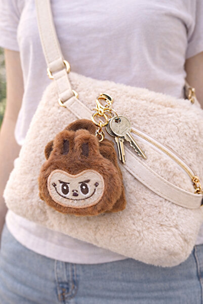 DKY حقيبة لابوبو الصغيرة على شكل حقيبة يد مع تفاصيل من القطيفة