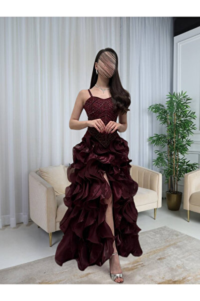 LITSHE A burgundy evening dress adorned with elegant layers of ruffles.