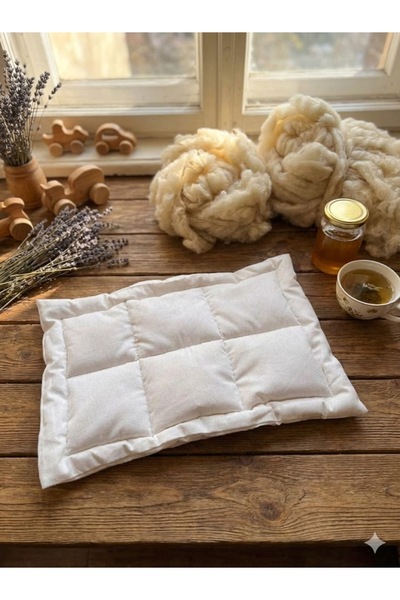 YUEM yıkanmamış yün dolgulu alez ,bebek alez ,lanolin içerir (ebat 30x50)