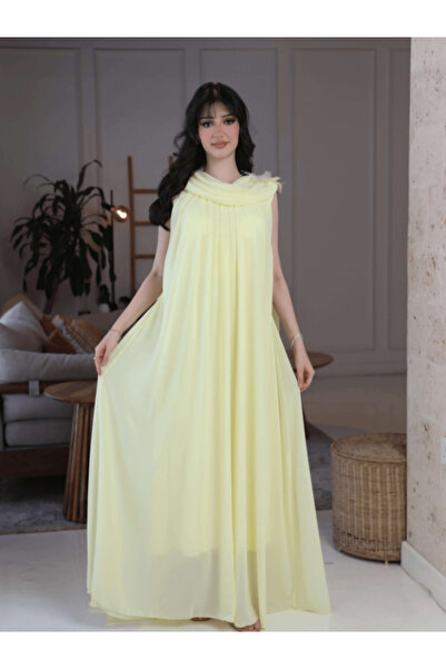TREN فستان ماكسي شيفون أنيق للحوامل | فستان أصفر بدون أكمام بتفاصيل وردة للنس...