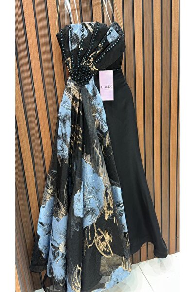 LAMSAT LATIN A black evening dress adorned with black beads and a scarf made ...