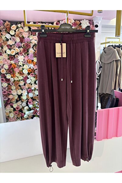 Yusuf Özdemir beli lastikli bağcık detaylı ayak paça büzgülü bordo kadın pant...