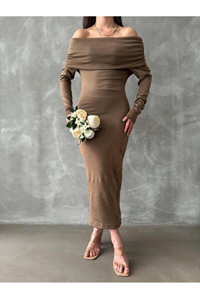 TOKARİS TEKSTİL المرأة إ