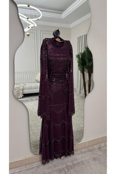 Sondos Fashion Luxurious evening dress in a royal aubergine color
