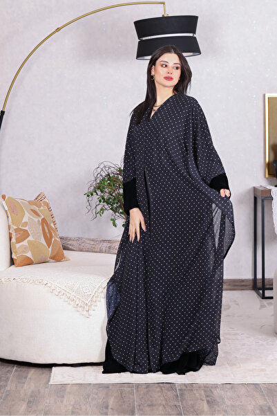 Generic Polka dot abaya with a subtle polka dot pattern, expertly tailored fo...