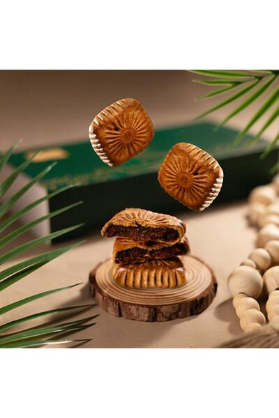 Khisab Alnakhil Maamoul (millet) with dates