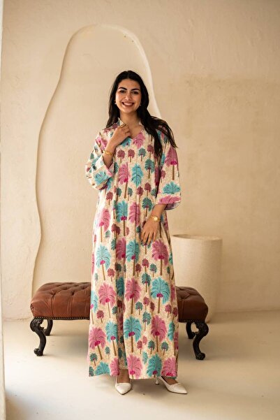 AFandina Jalabiya with delicate nature-inspired patterns for a serene and ele...