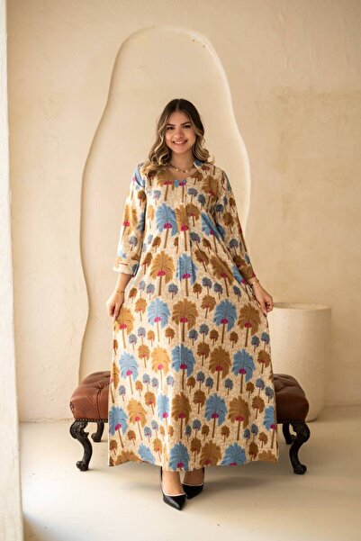 AFandina Jalabiya with delicate nature-inspired patterns for a serene and ele...