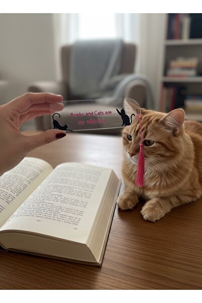 AUREVA علامة كتاب مع شعار القط والكتاب