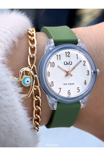 Q&Q ساعة يد نسائية بسوار من السيليكون باللون الأخضر مع أرقام بيضاء + هدية سوا...
