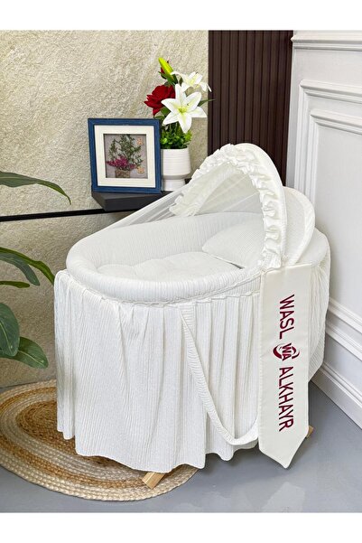WASL ALKHAIR A stylish and safe baby Moses basket crib made of sturdy iron an...