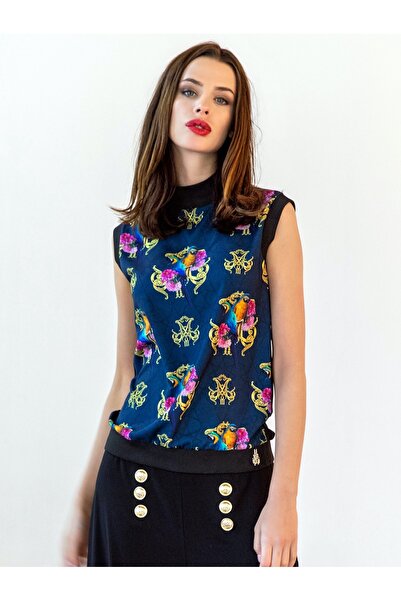 FB sa Luxurious women's blouse with a high neck and iconic navy prints - a sl...